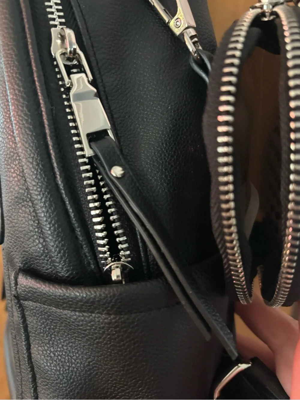 Madden NYC Black Mini Backpack with Front Zip Pockets